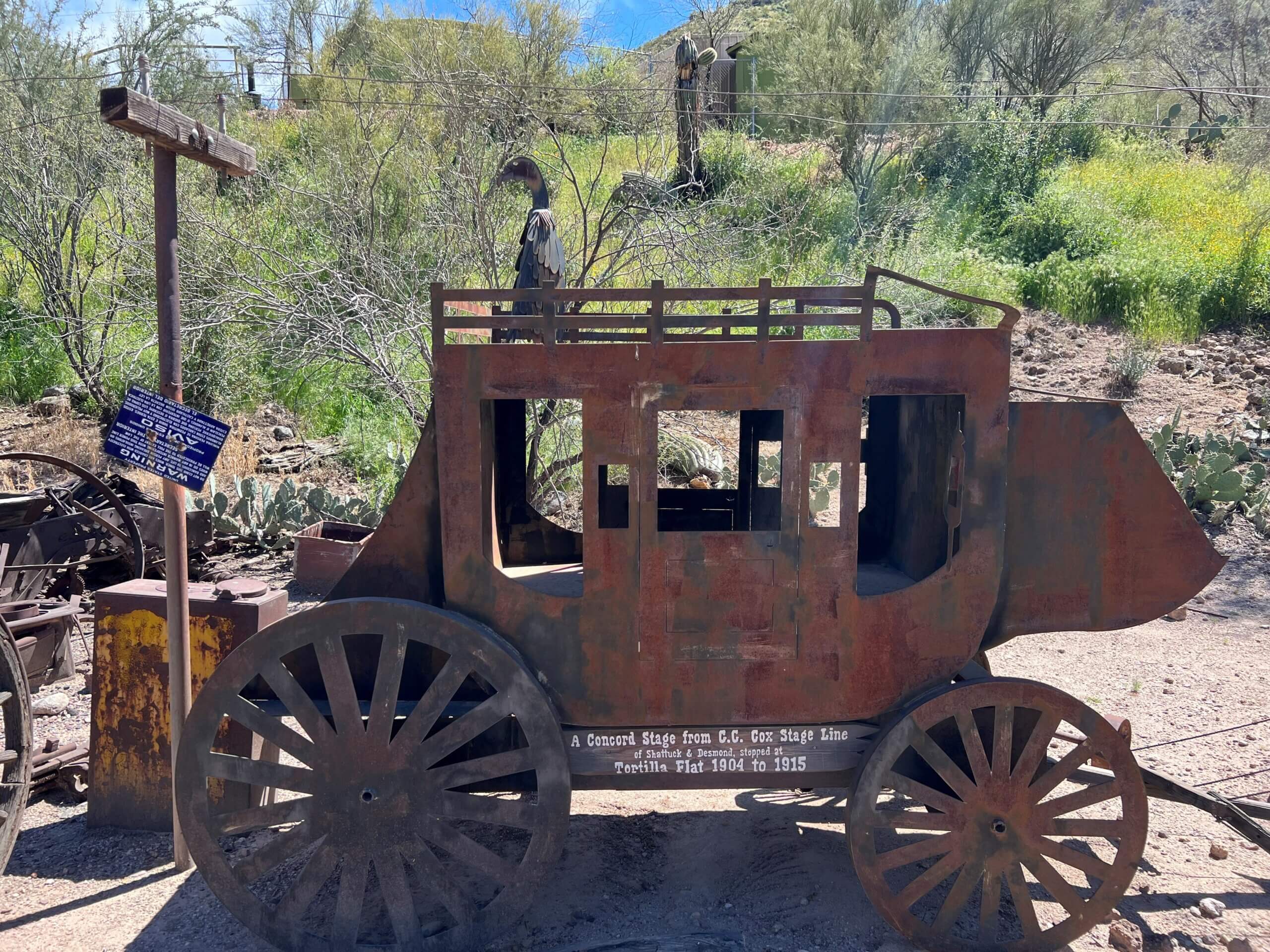 A rusty stagecoach sits outside in Tortilla Flat, a ghost town near Apache Junction.